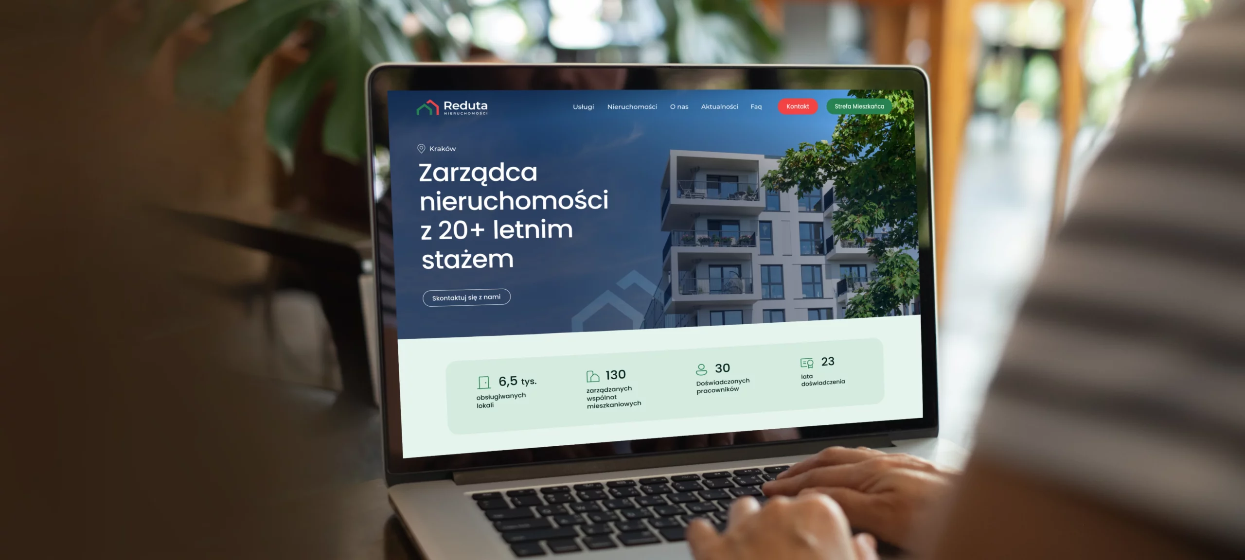 Strona WWW dla firmy zarządzającej nieruchomościami Reduta — widok strony głównej
